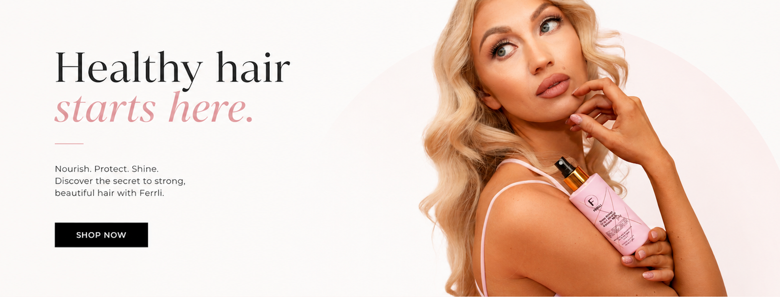 Blonde woman holding Ferrli hair care